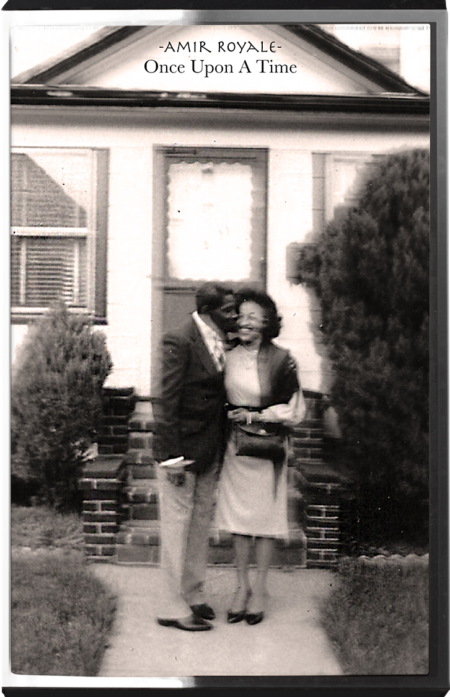A vintage 1961 photograph of a young man and woman embracing outside of a suburban home.